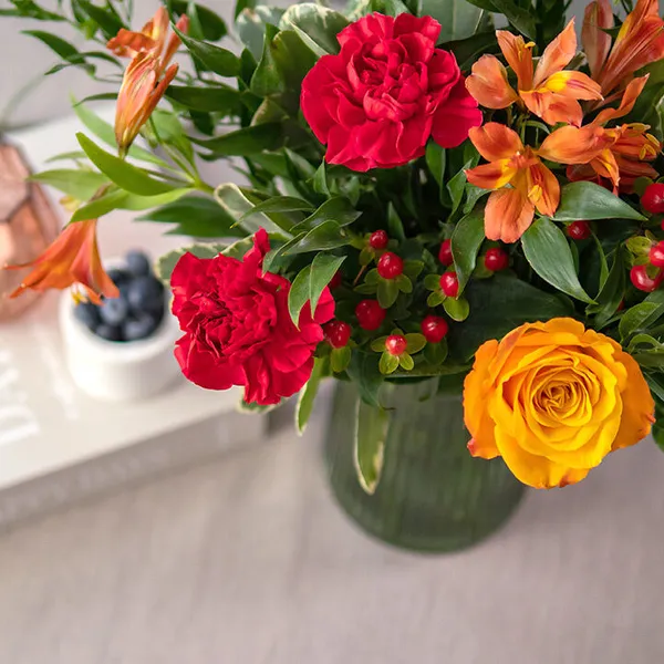 Red carnations with mixed flowers